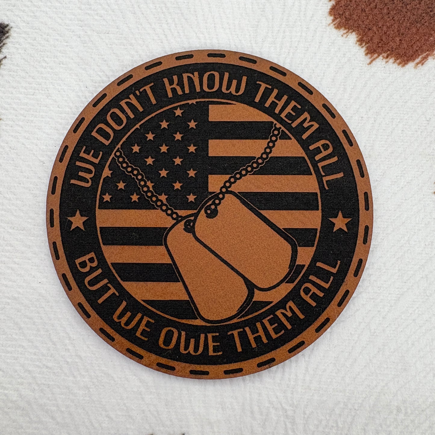 We Don't Know Them All But We Owe Them All- 2.5" round Leatherette Patch