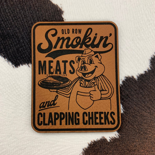 Old Row Smokin' Meats and Clapping Cheeks- 1.95" wide x 2.45“ tall Leatherette Patch