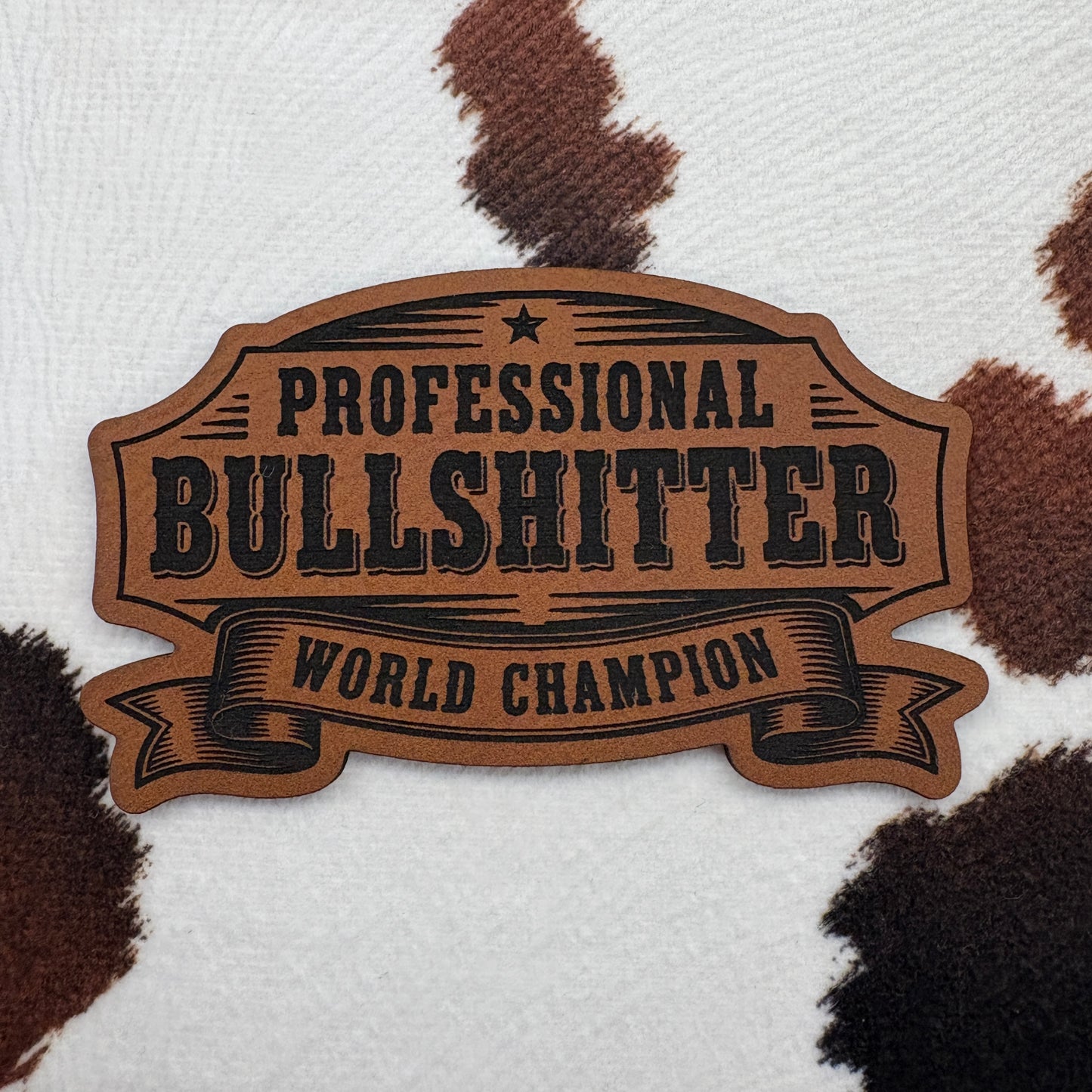 Professional Bullsh!tter World Champion Banner- 3.25” wide x 1.8” tall Leatherette Patch