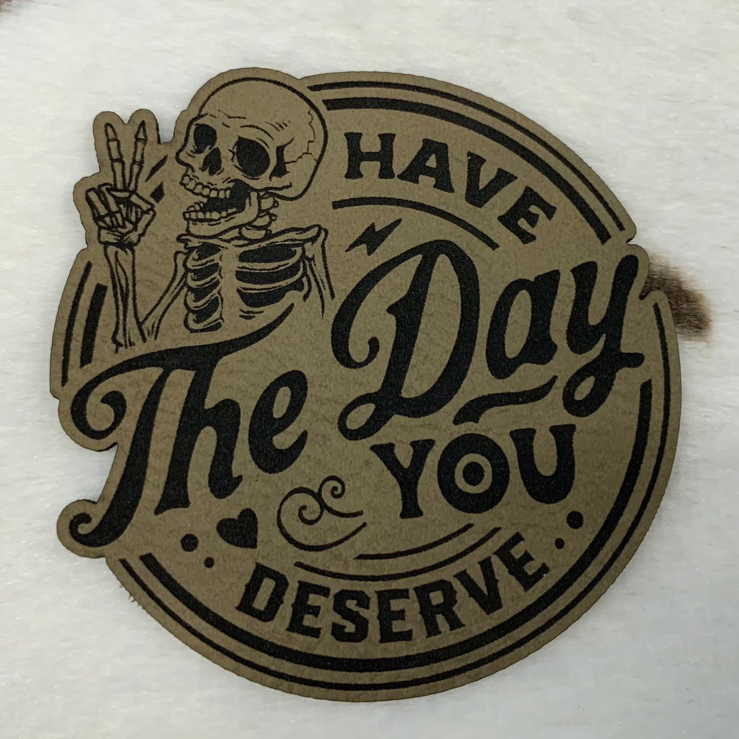 Have the Day You Deserve- 2.5" wide x 2.65" tall Leatherette Patch